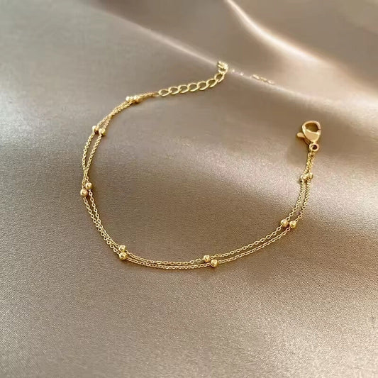 Fashion double-layer small round pearl golden bracelet